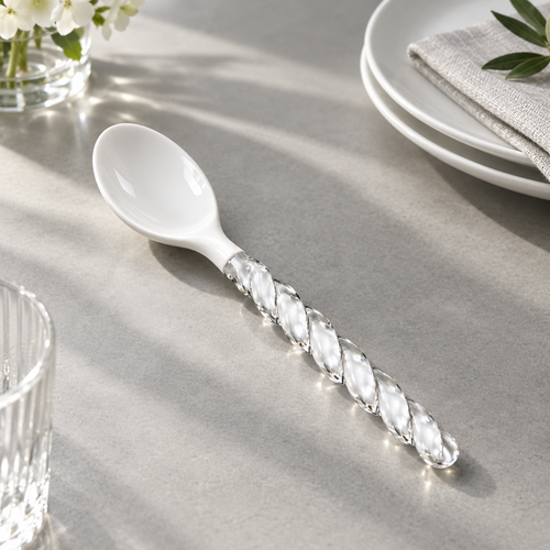 Side view of ceramic spoon with glass handle