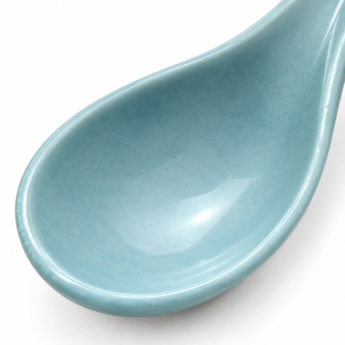 Remoxila ceramic spoon rest on white background.