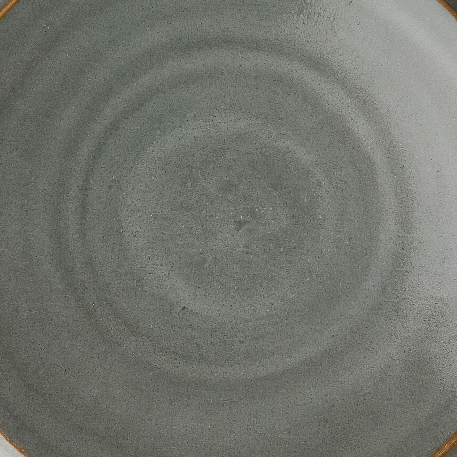 Remoxila Stormy Grey Plate — macro close-up of glaze surface texture at center