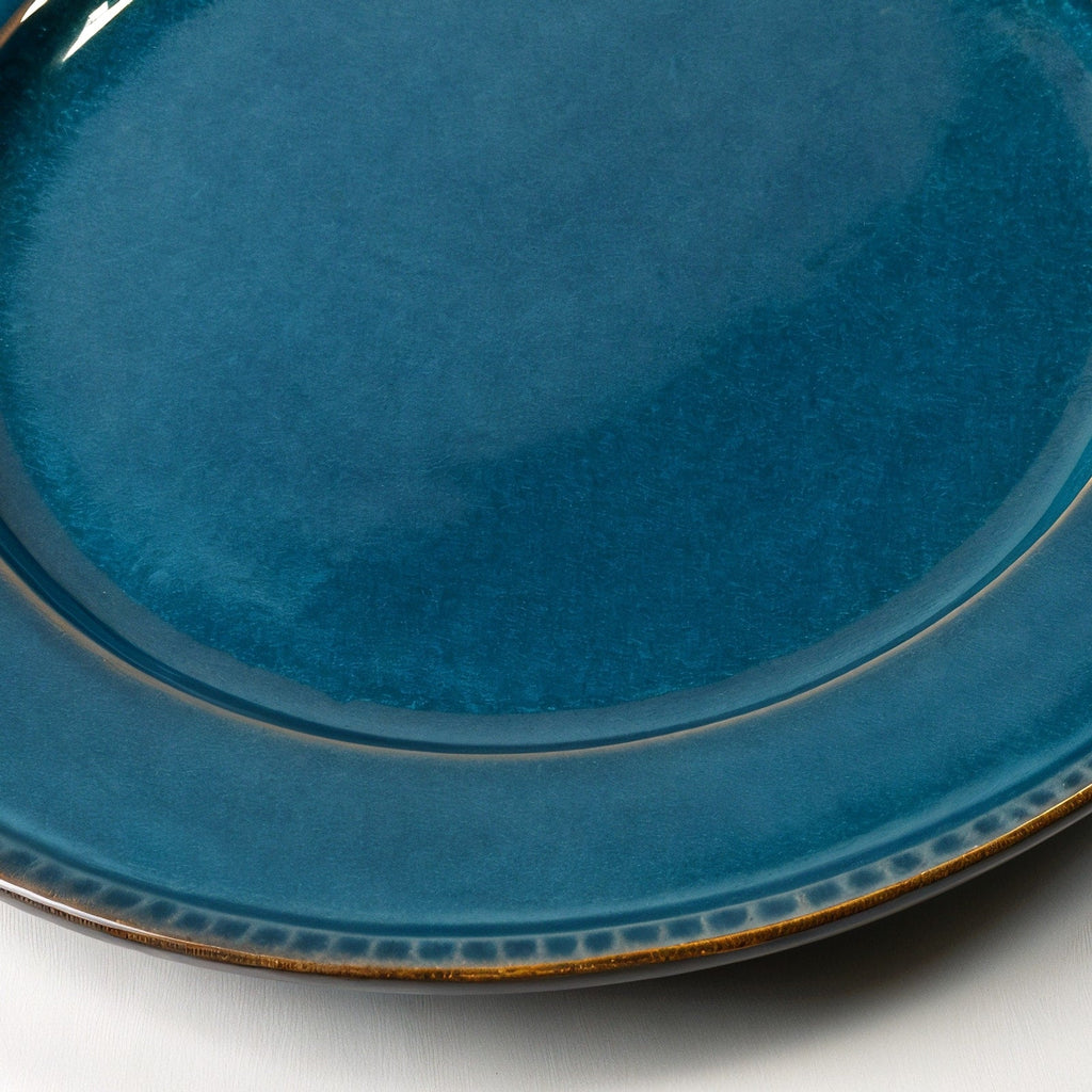 Remoxila Deep Ocean Plate — macro close-up of raised rim and glaze pooling