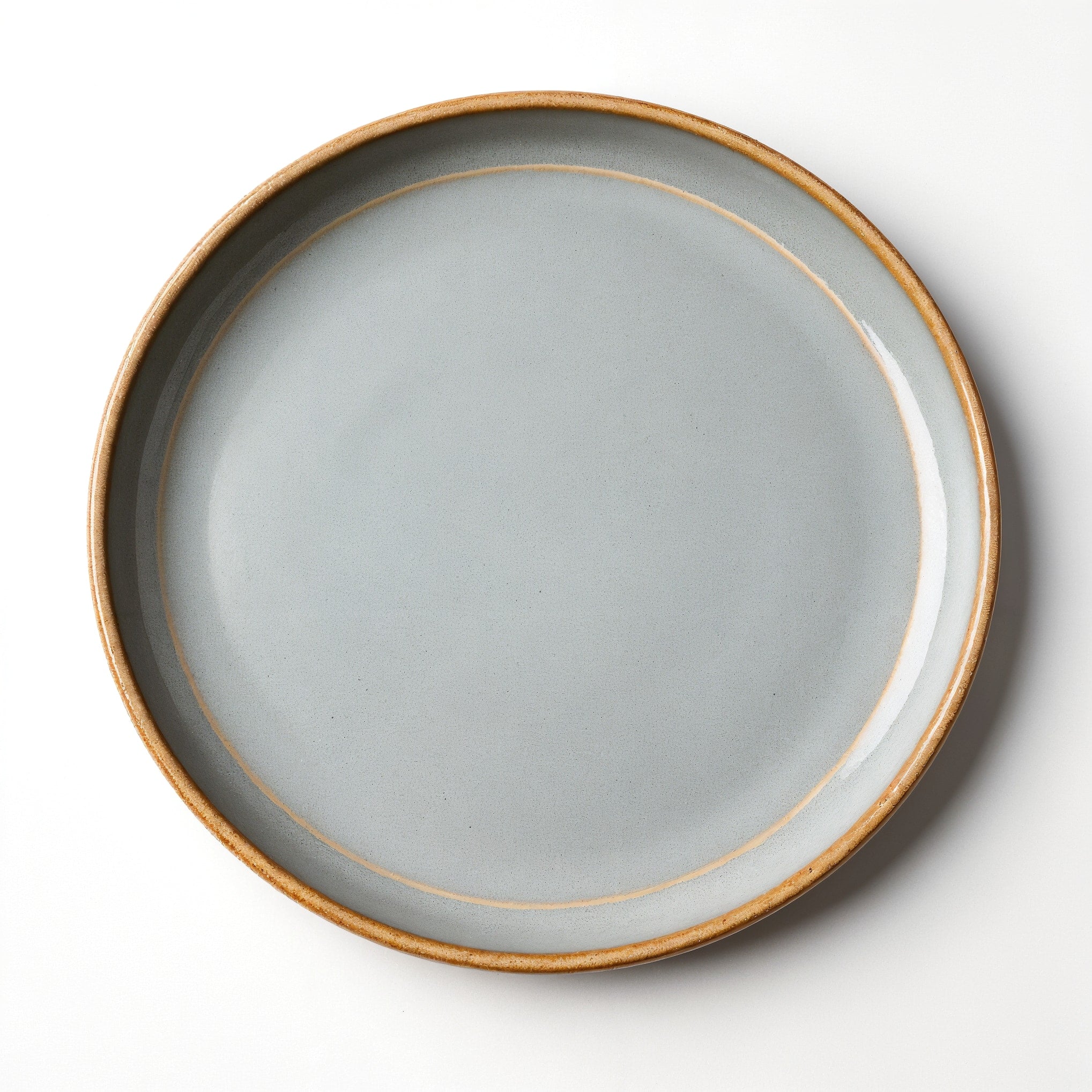 Remoxila Minimalist Grey Plate — top-down view showing entire top surface and rim as a perfect circle