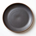 Remoxila Charcoal Black Stoneware Plate — top-down view showing the plate as a perfect circle