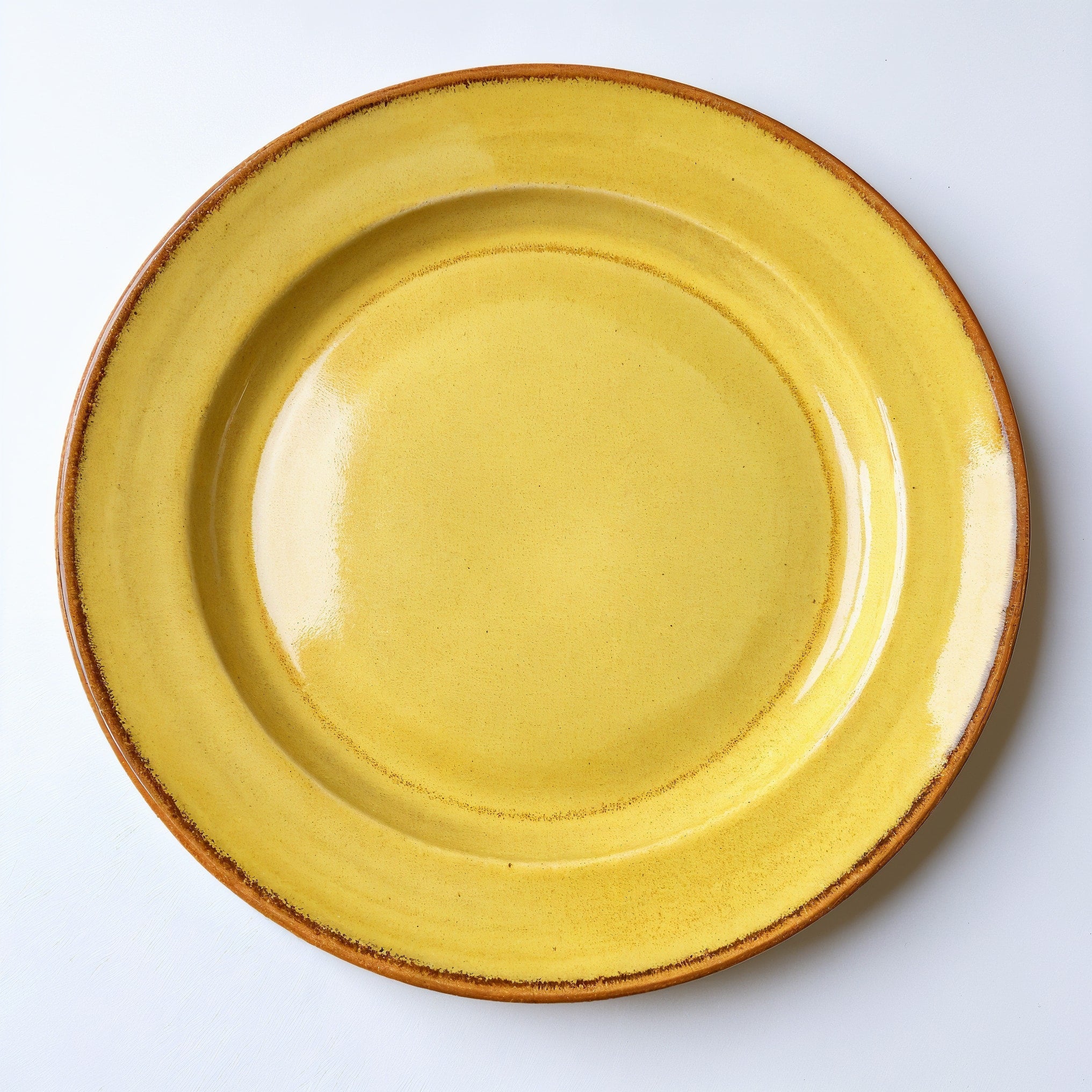 Remoxila Golden Yellow Stoneware Plate — top-down view showing circular shape and surface