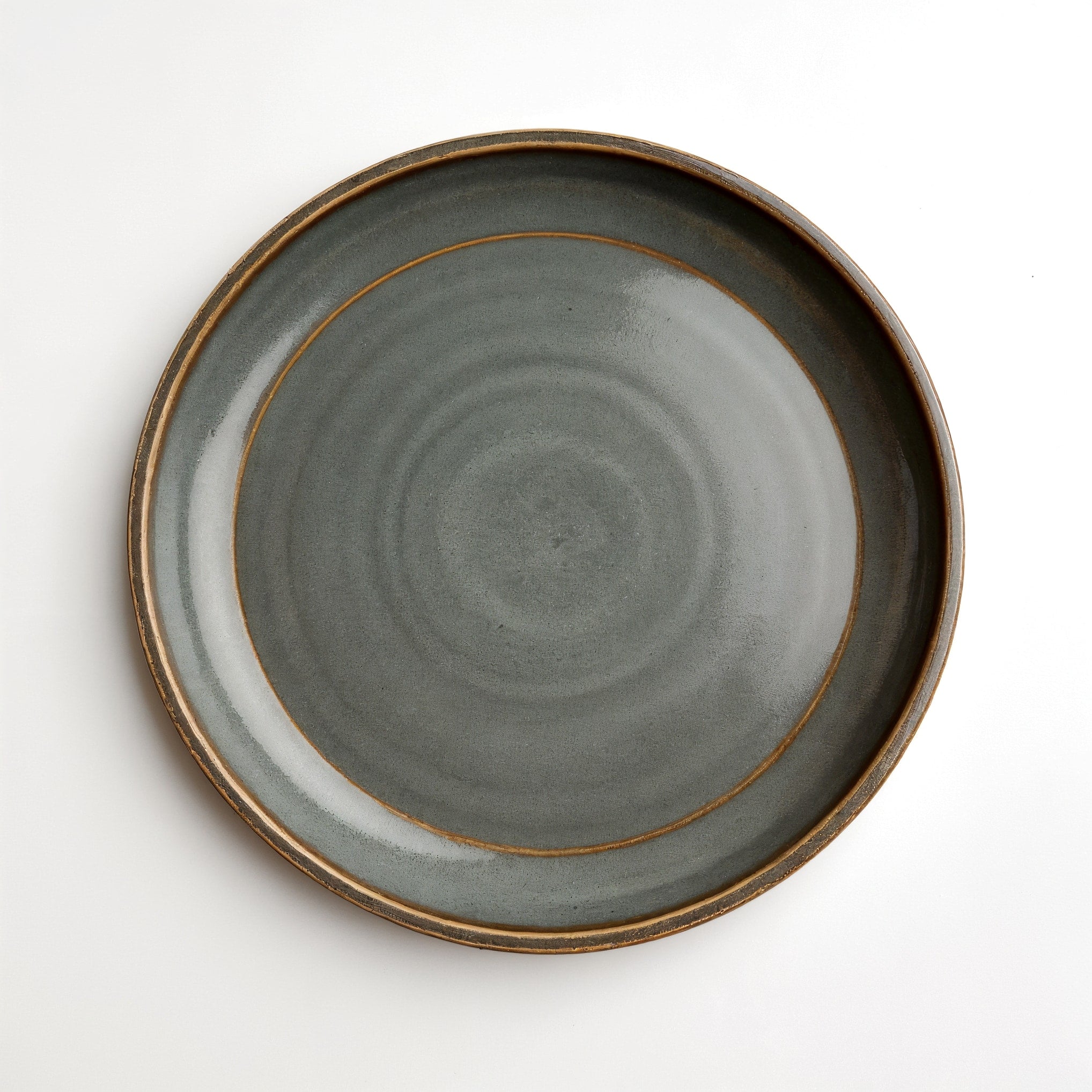Remoxila Stormy Grey Plate — strict top-down view showing full round face and glaze