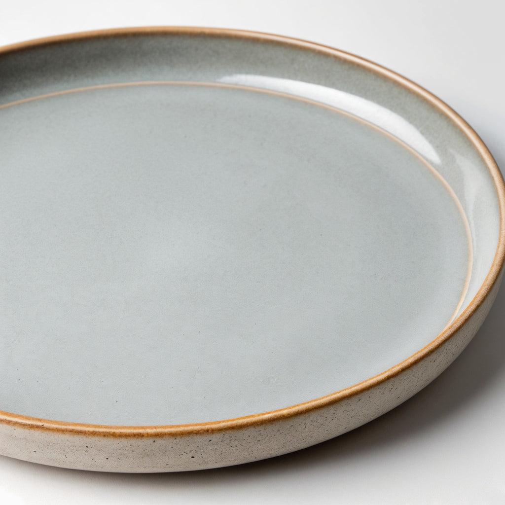 Remoxila Minimalist Grey Plate — three-quarter angled view showing full top face and raised rim